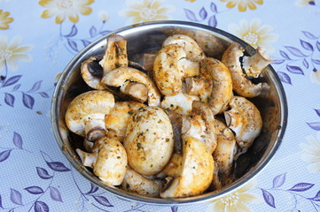 Bowl with pickled meadow mushrooms for barbecue