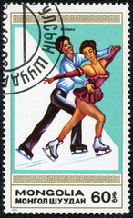 stamp printed by Mongolia shows the figure skating