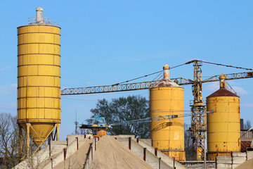 concrete factory with crane and tanks industry zone