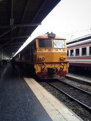 Fototapeta premium old yellow train in platform