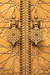 Golden door at the palace in fez, morocco