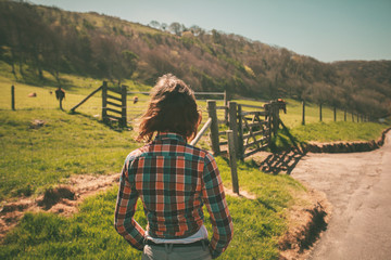 Fototapeta na wymiar Young woman on a ranch