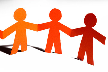 Paper team linked together partnership concept