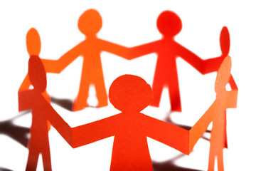 Paper team linked together partnership concept