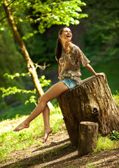 Young attractive woman relaxing  in nature