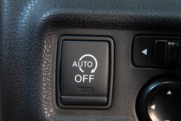 stop-start system button