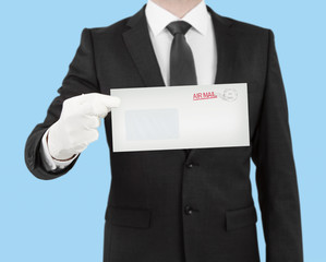 businessman giving a envelope