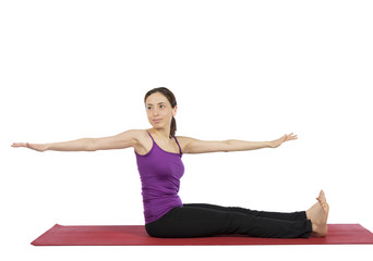 Woman doing pilates abs exercises