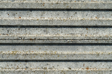 Background texture from light rough concrete bands