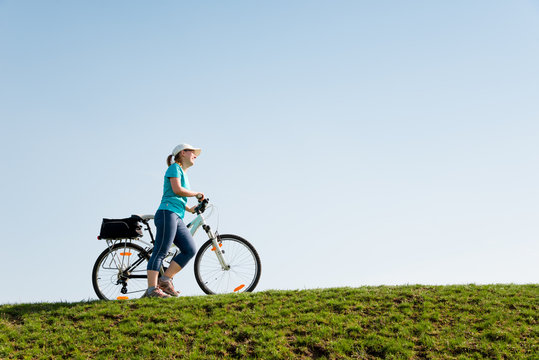 woman cycling outdoors