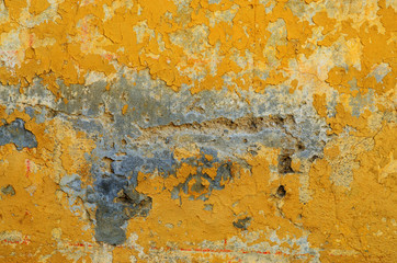 Texture of orange old shabby painted wall