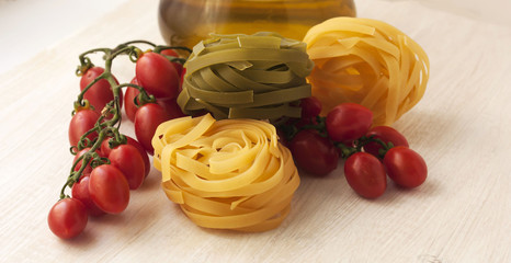 Raw pasta,vegetables ,olive oil