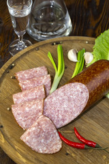 sausage on a wooden plate in a restaurant