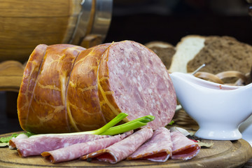 sausage on a wooden plate in a restaurant