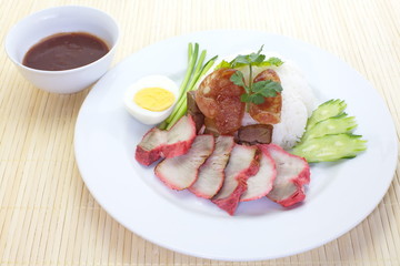red pork with white rice and sauce