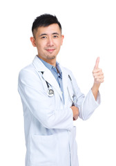 Young doctor with finger thumb up