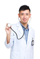 Asian male doctor holding stethoscope