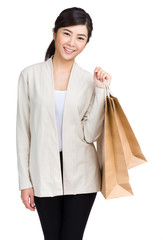 Young woman with shopping bag