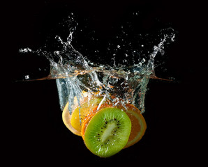 Tropical fruits fall underwater