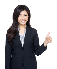 Happy businesswoman with thumb up