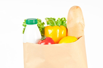 Fresh healthy groceries in a paper bag