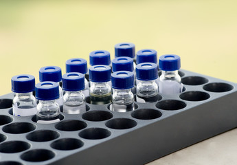 Sample vial in instrumental analysis tray