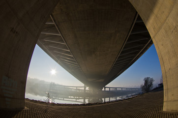 Sunrise on a river bank under cable bridge, Belgrade