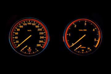 Speedometer and tachometer of a sport car