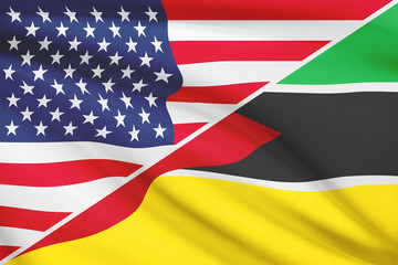 Series of ruffled flags. USA and Republic of Mozambique.