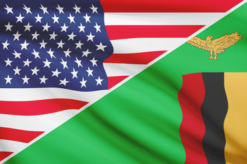 Series of ruffled flags. USA and Republic of Zambia.
