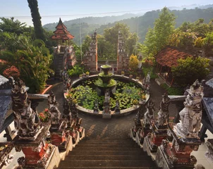 Poster Banjar budhist temple Bali at sunrise, Bali landmark, Indonesia © honzahruby