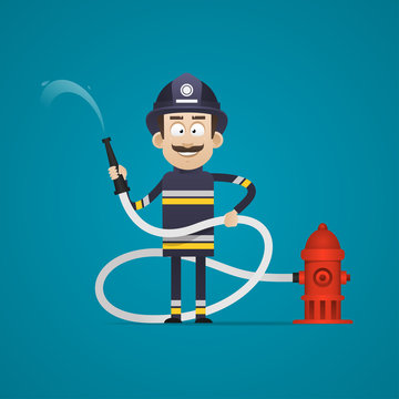 Fireman holds fire hose and smiling