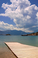 Sea bay with a wooden pier