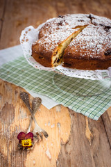 Homemade vanilla cake with raisins. Selective focus on flower