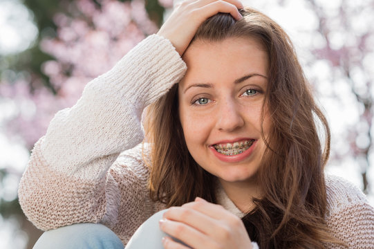 Happy Girl Wearing Braces Spring Portrait