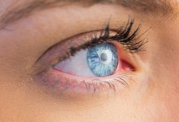 Fototapeta na wymiar Close up of female blue eye