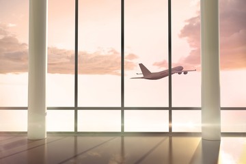Airplane flying window at sunrise