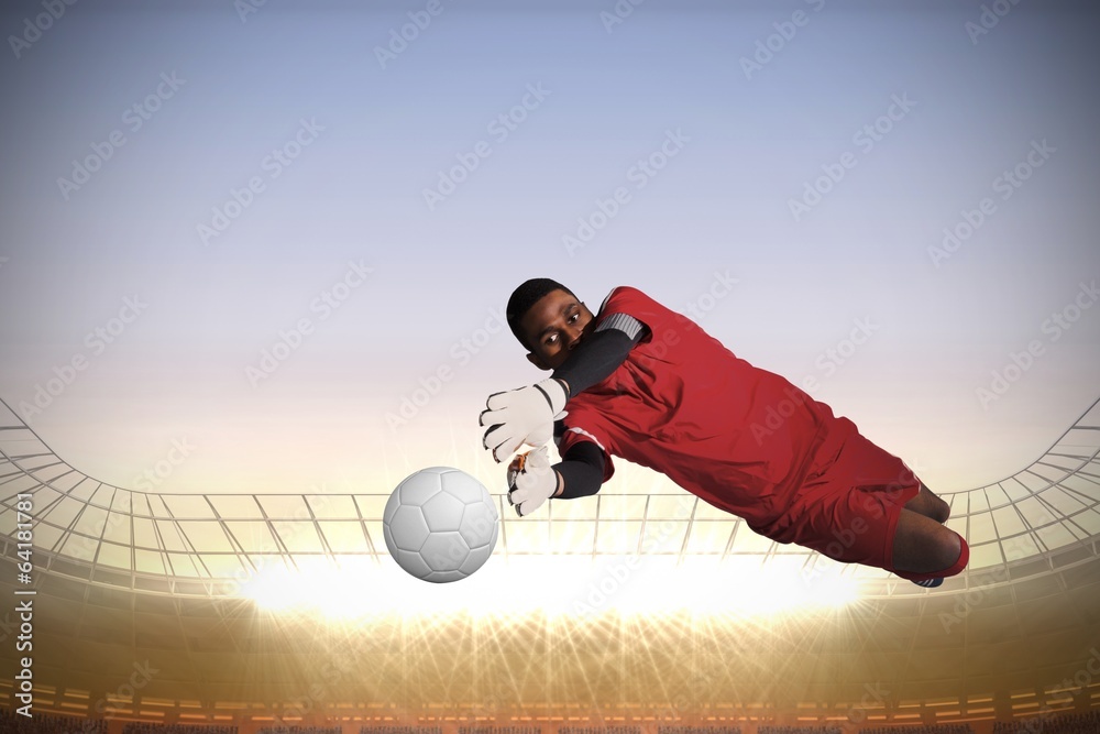 Aufkleber composite image of goalkeeper in red making a save