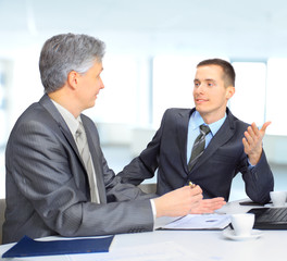 A business team sitting in office and planning work