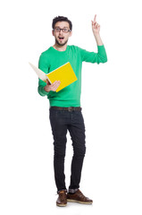 Young student with book on white