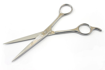Professional haircutting scissors isolated on white.