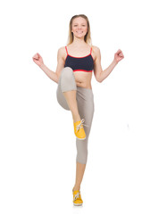Young female doing exercises on white