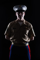 Contour shot of US marine in blue dress uniform
