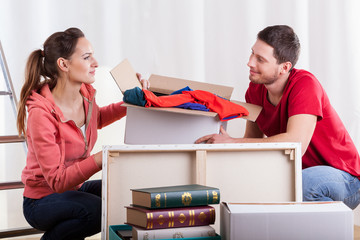 Young marriage packing stuff