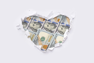 Heart made ​​of dollar bills