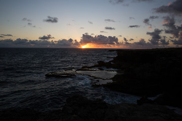 Fototapeta premium View of the sunrise over the ocean from Cape