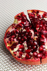 Ripe pomegranates on light background