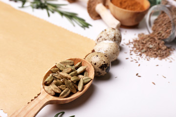 Different spices and blank paper, isolated on white