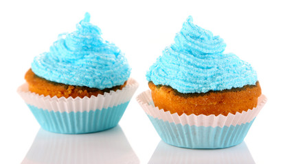 Tasty cup cakes with cream, isolated on white