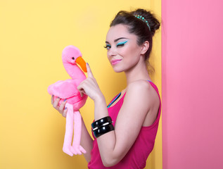 Beautiful girl with a toy.